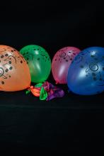 25 Ballons fluo musique assortiment de couleurs